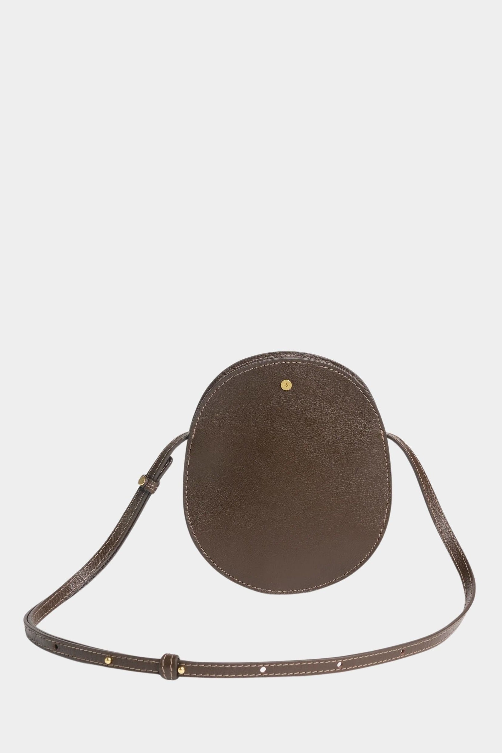 LINDQUIST Mini Eggi leather bag in Chaga with an oval silhouette, tonal stitching, and spherical brass snap