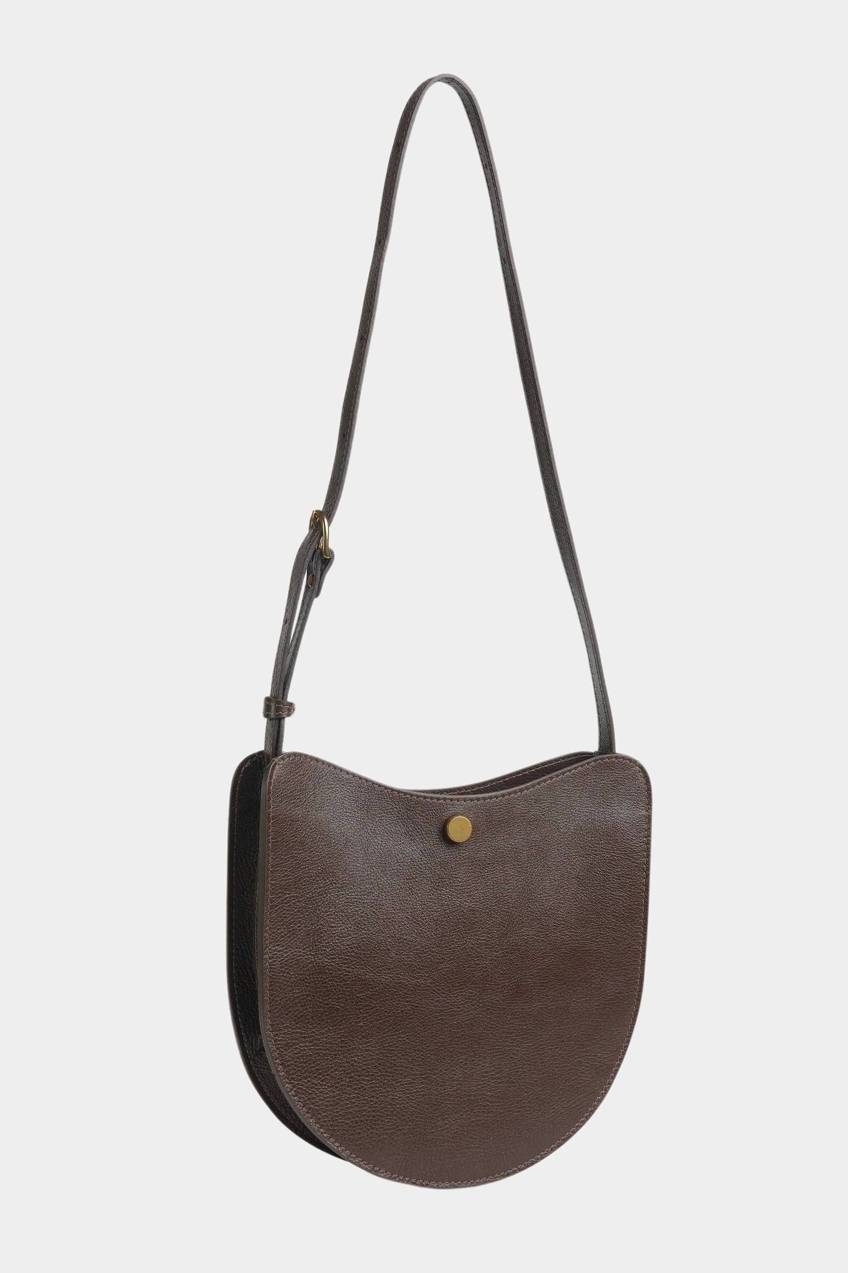 LINDQUIST Savoie bag in Chaga shown with its leather strap extended for crossbody wear