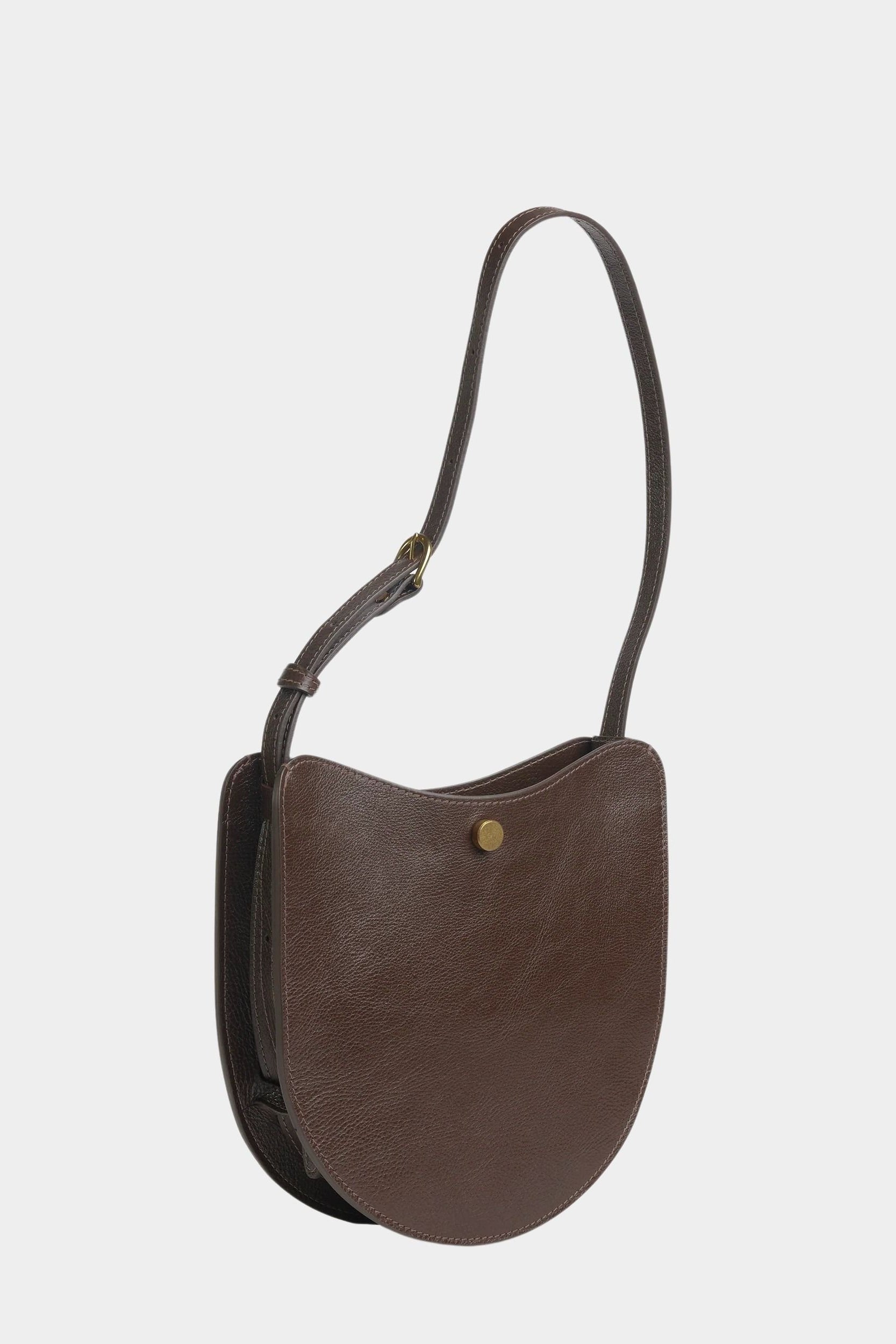 Image 70
LINDQUIST Savoie leather bag in Chaga with an adjustable strap and brass snap, offered at YUCCA in Denver