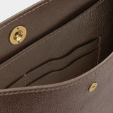 Interior leather card pockets and tonal stitching inside the LINDQUIST Savoie bag in Chaga
