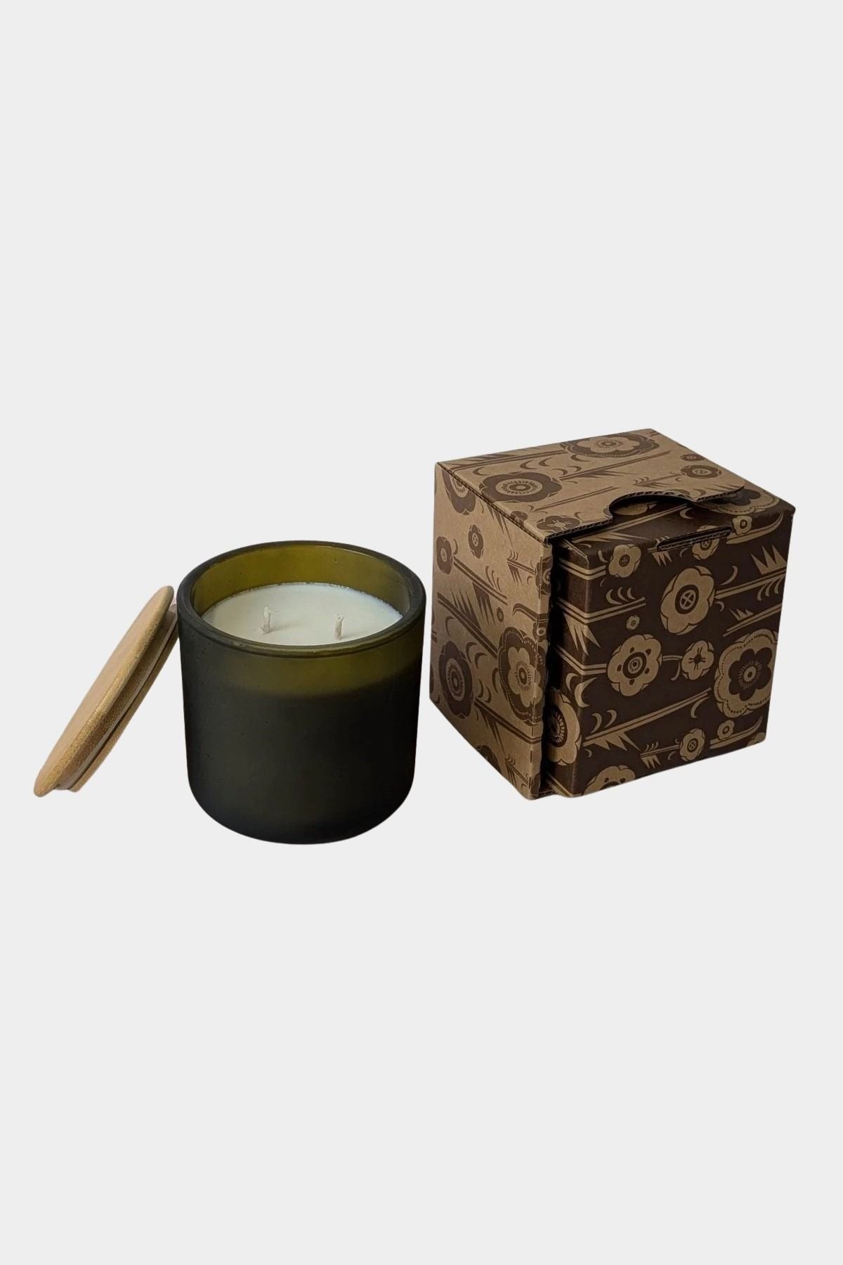 Los Poblanos Vela del Bosque Candle with dark frosted glass vessel, bamboo lid, and floral gift box available at YUCCA Denver boutique in Denver, Colorado