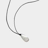 Maslo - Large Pebble Pendant Necklace - YUCCA, minimalist sculptural jewelry for women, women’s artistic jewelry.