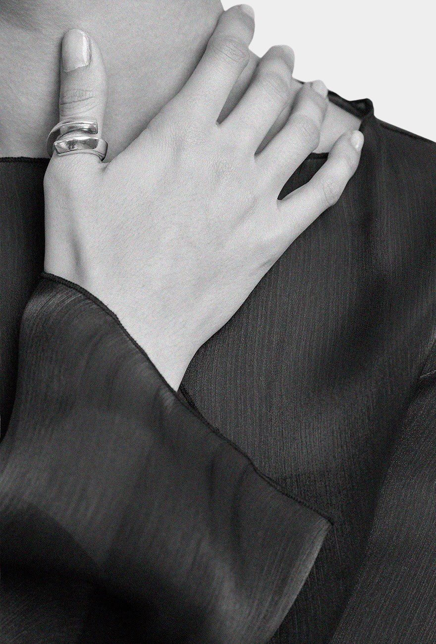 Maslo Jewelry wrap ring in sterling silver worn on hand