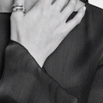 Maslo Jewelry wrap ring in sterling silver worn on hand