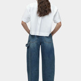 Mijeong Park blue barrel leg patch denim back view relaxed sculpted barrel leg jeans in structured cotton denim