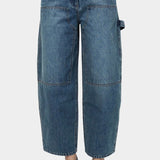 Mijeong Park barrel leg patch denim blue relaxed mid rise barrel leg jeans with front patch pockets modern sculpted denim silhouette