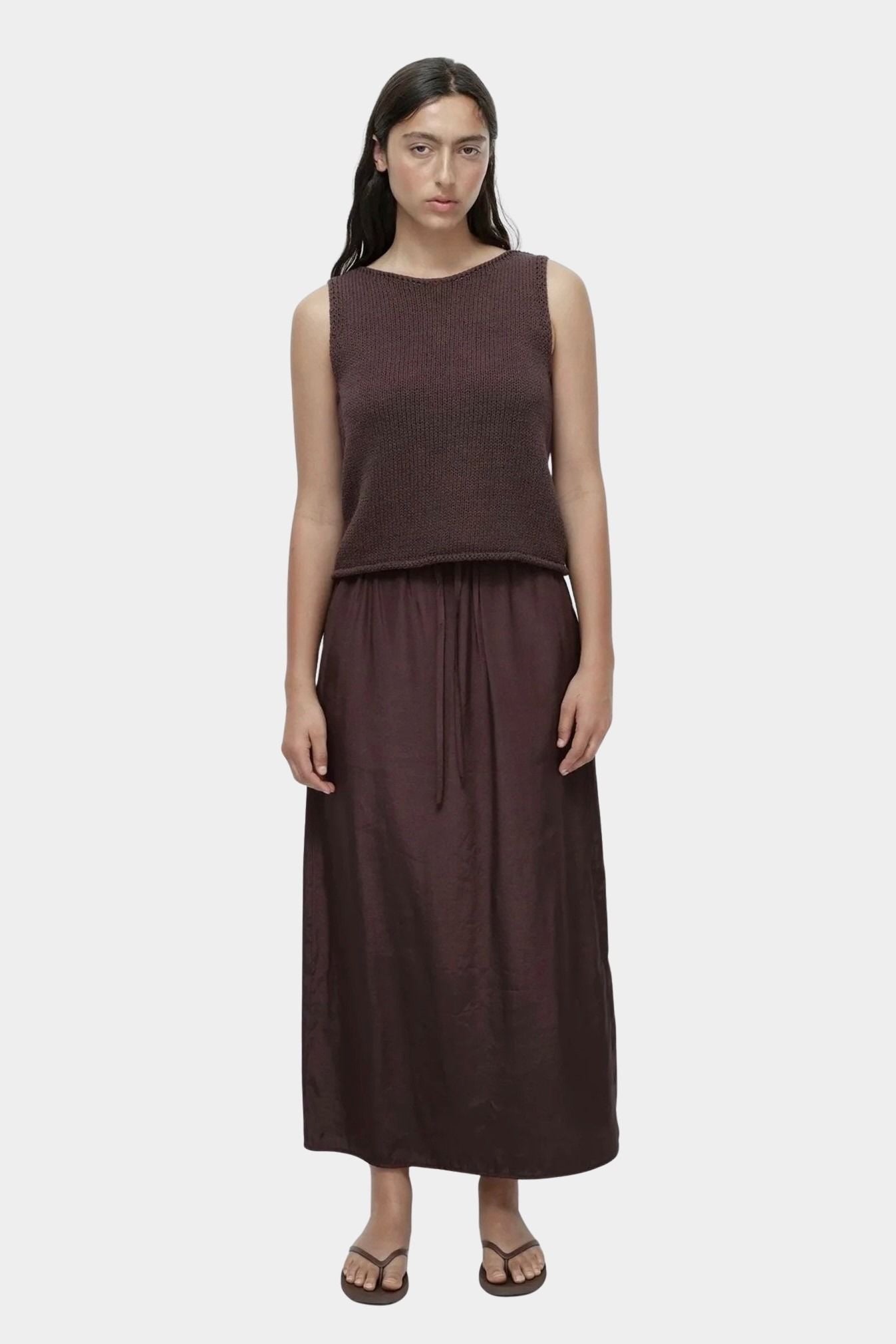 Mijeong Park dark brown boat neck minimal knit tank full outfit sleeveless cotton linen knit top styled with brown skirt minimalist summer look