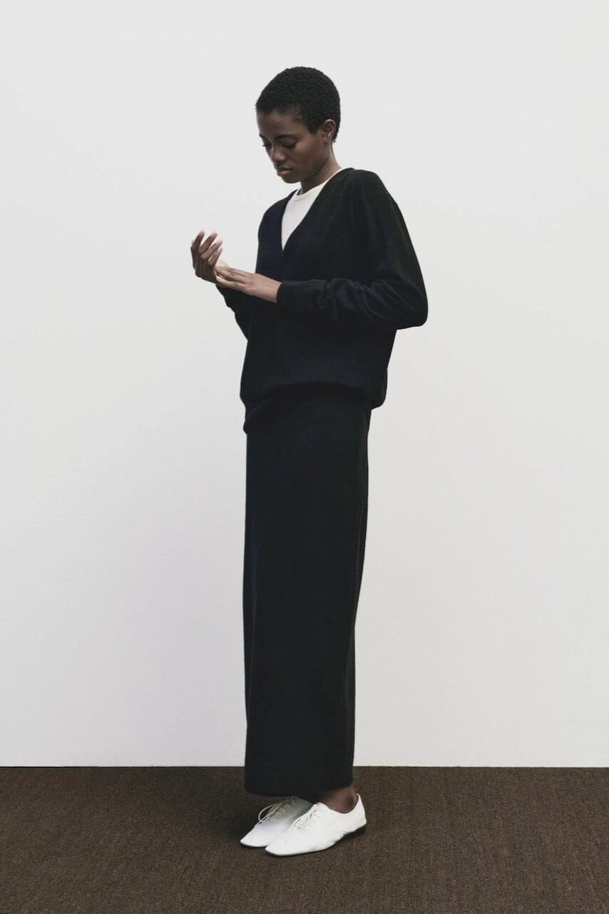 Black cashmere blend knit midi skirt by Mijeong Park