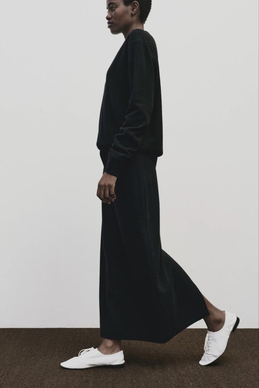 Black cashmere blend knit midi skirt by Mijeong Park