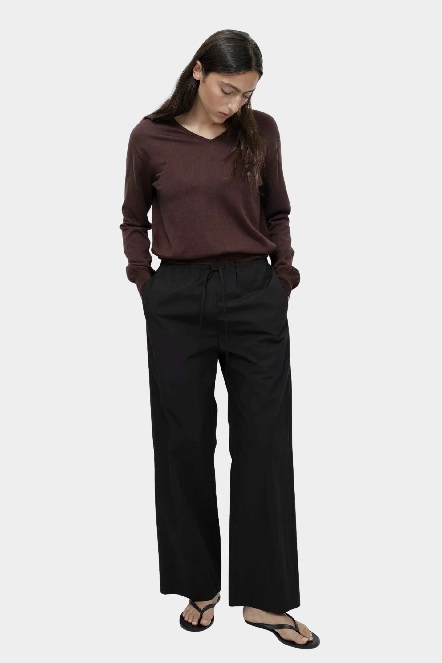 Mijeong Park cotton drawstring pants black relaxed wide leg elastic waist minimalist womens designer trousers full outfit view