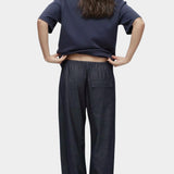 Mijeong Park denim drawstring pants back view relaxed wide leg elastic waist minimalist womens designer trousers