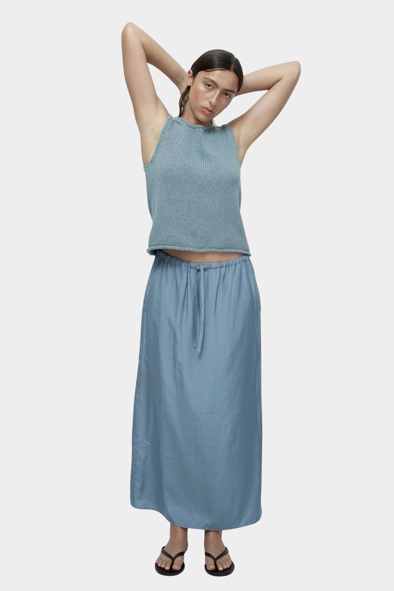 Mijeong Park blue drawstring midi skirt lightweight satin elastic waist relaxed straight fit full length front view