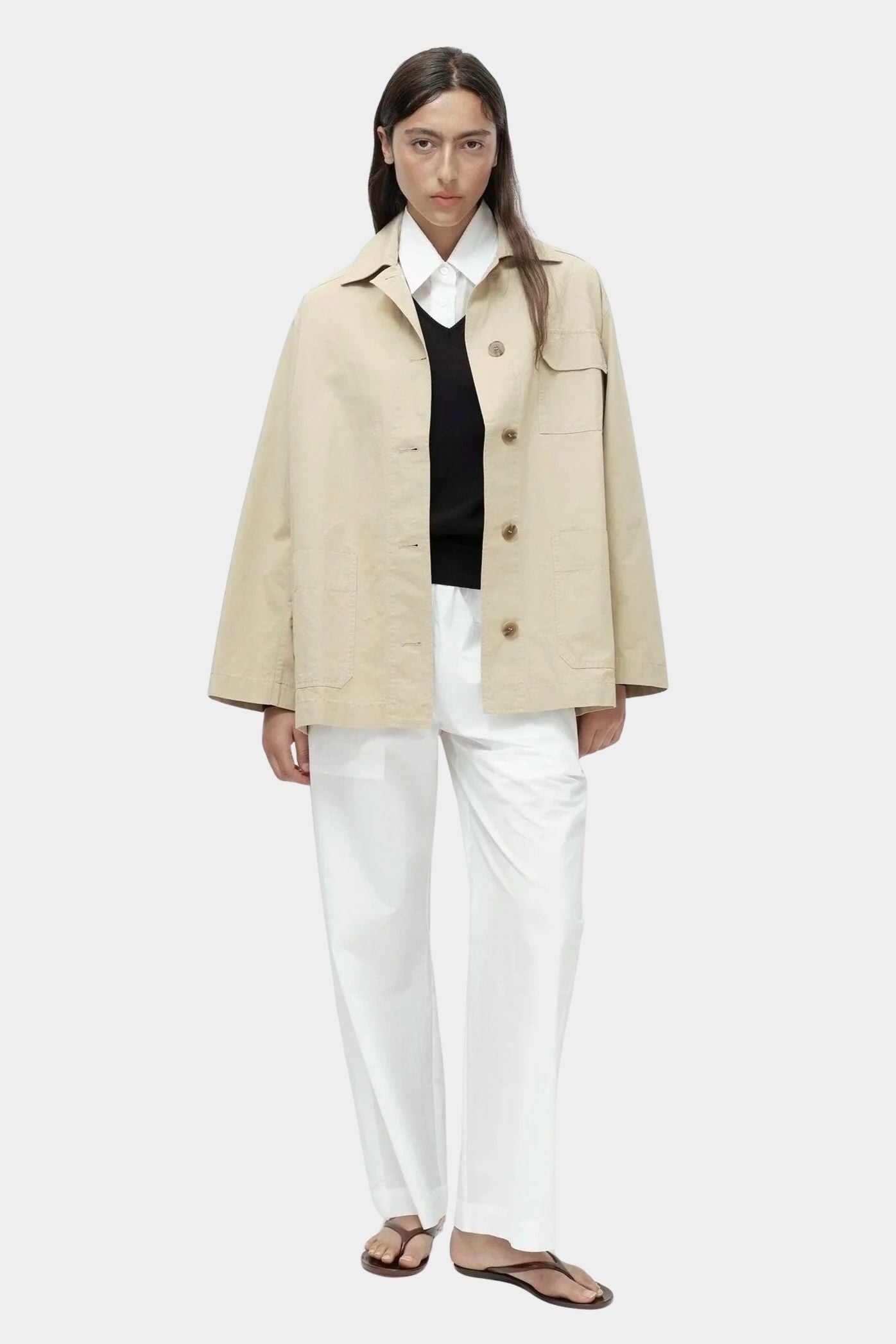Linen blend work jacket in beige by Mijeong Park with oversized fit, pointed collar, and front button closure