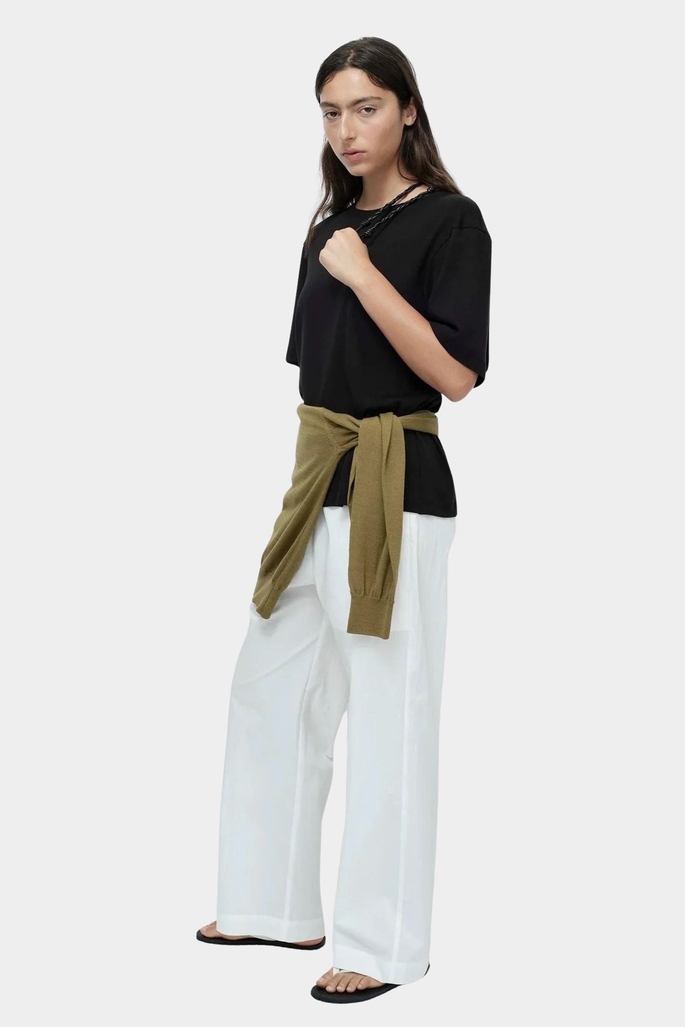 Mijeong Park oversized black cotton t shirt relaxed minimalist crewneck tee styled outfit white wide leg trousers womens designer clothing