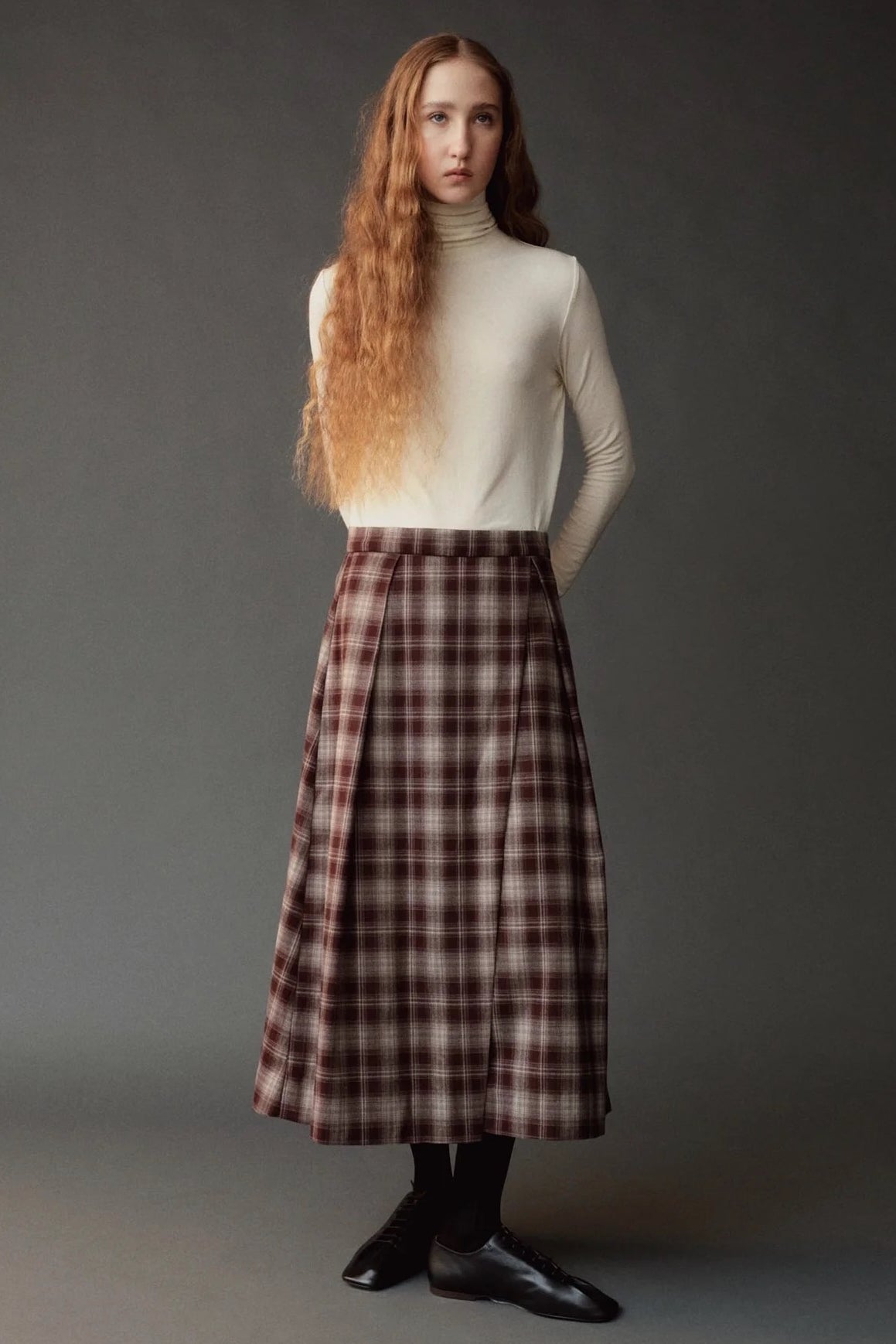 Front view of the Mijeong Park Plaid Midi Skirt showing its full A line silhouette
