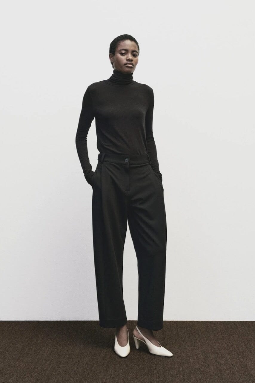 Black slim fit Tencel cotton roll neck top by Mijeong Park