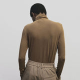 Light brown slim fit roll neck jersey top by Mijeong Park