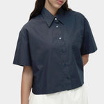 Cropped navy cotton poplin short sleeve shirt with pointed collar and relaxed oversized fit