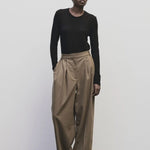 Black slim fit wool Tencel crewneck sweater by Mijeong Park