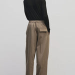 Black slim fit wool Tencel crewneck sweater by Mijeong Park