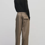 Black slim fit wool Tencel crewneck sweater by Mijeong Park
