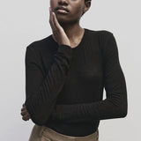 Black slim fit wool Tencel crewneck sweater by Mijeong Park