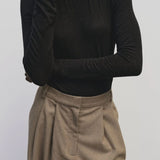 Black slim fit wool Tencel crewneck sweater by Mijeong Park