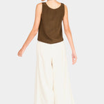 Side/back view of brown sleeveless tank showing relaxed drape and low armholes