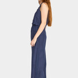 Side view of blueberry cotton pants with ankle length and wide leg drape