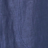 Close up of blueberry cotton fabric showing hand loomed texture and seam detail
