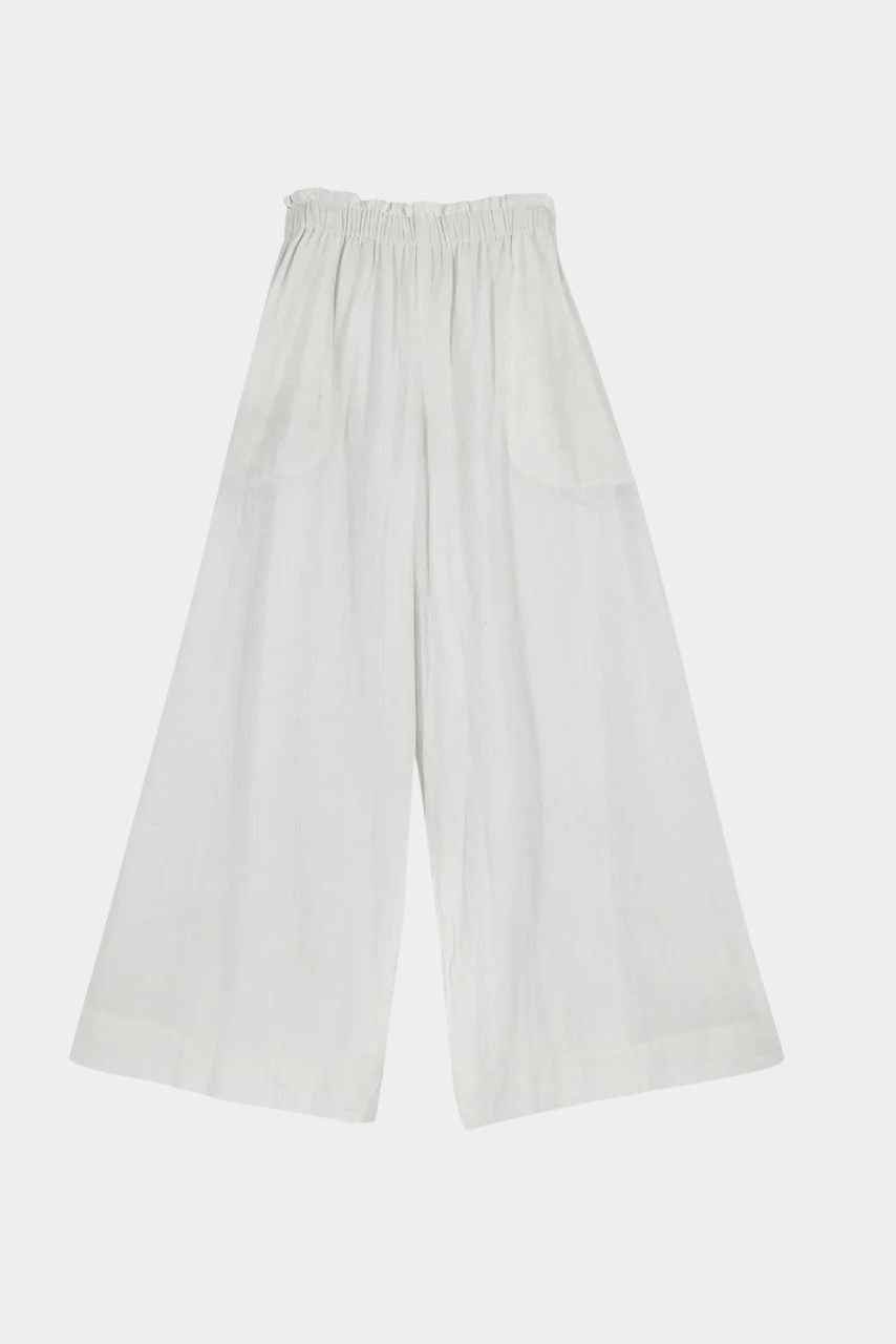 White wide leg ankle length pants flat lay with elastic waistband and loose silhouette