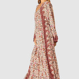 Natalie Martin Fiore Maxi Wildflower Spice floral maxi dress side profile with long sleeves and border print