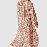 Natalie Martin Fiore Maxi Wildflower Spice floral maxi dress back view with flowing silhouette and long sleeves