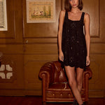 Natalie Martin Nadia Dress Black Silk Embroidery full-length interior view with relaxed silk mini silhouette