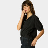 Natalie Martin Violet Top in Black Flat Cotton side angle with soft gathered sleeves