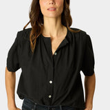 Close-up of Natalie Martin Violet Top in Black Flat Cotton with shell button detailing