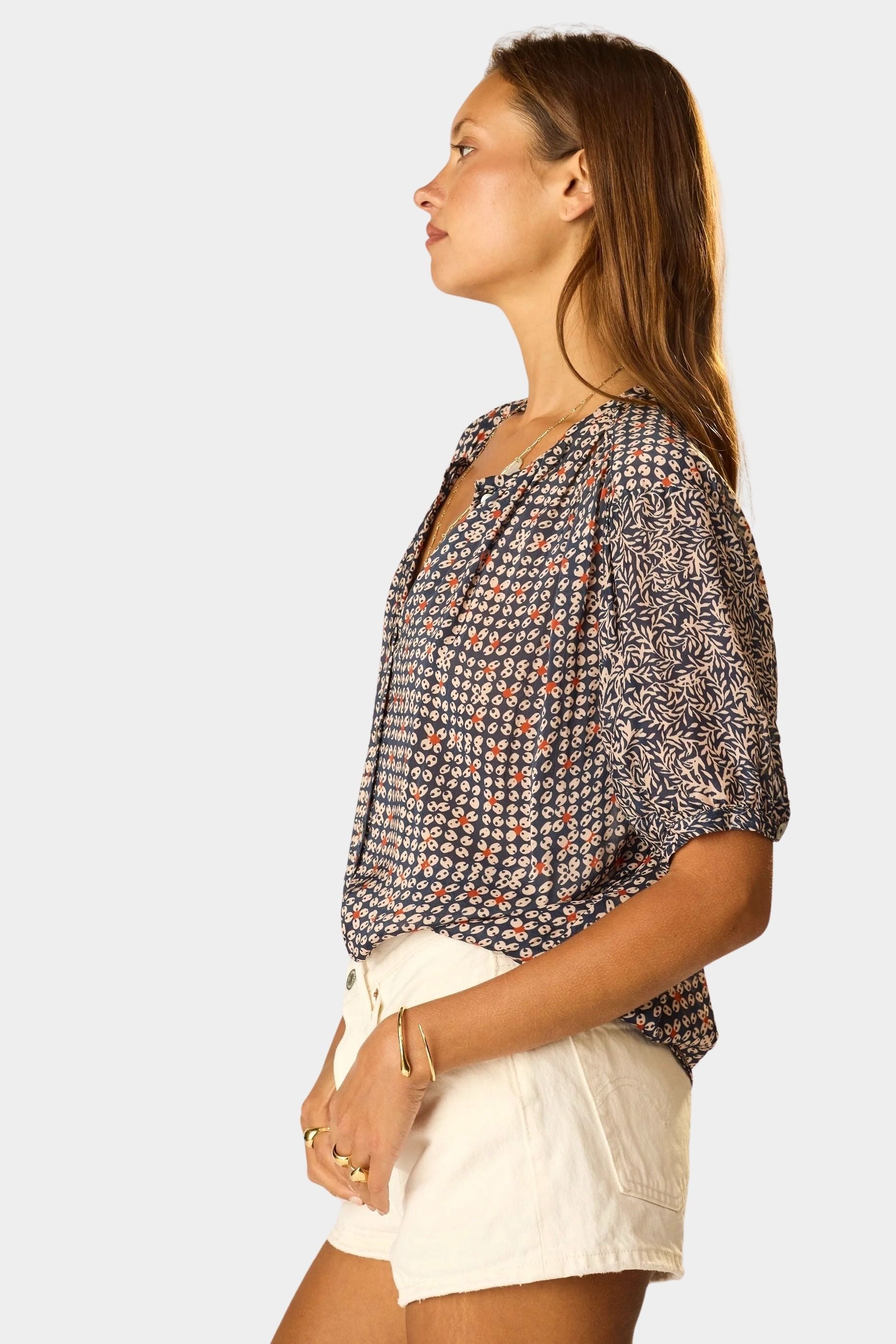 Natalie Martin Violet Top Delphi Ink side profile view with relaxed bohemian silhouette and mixed print details