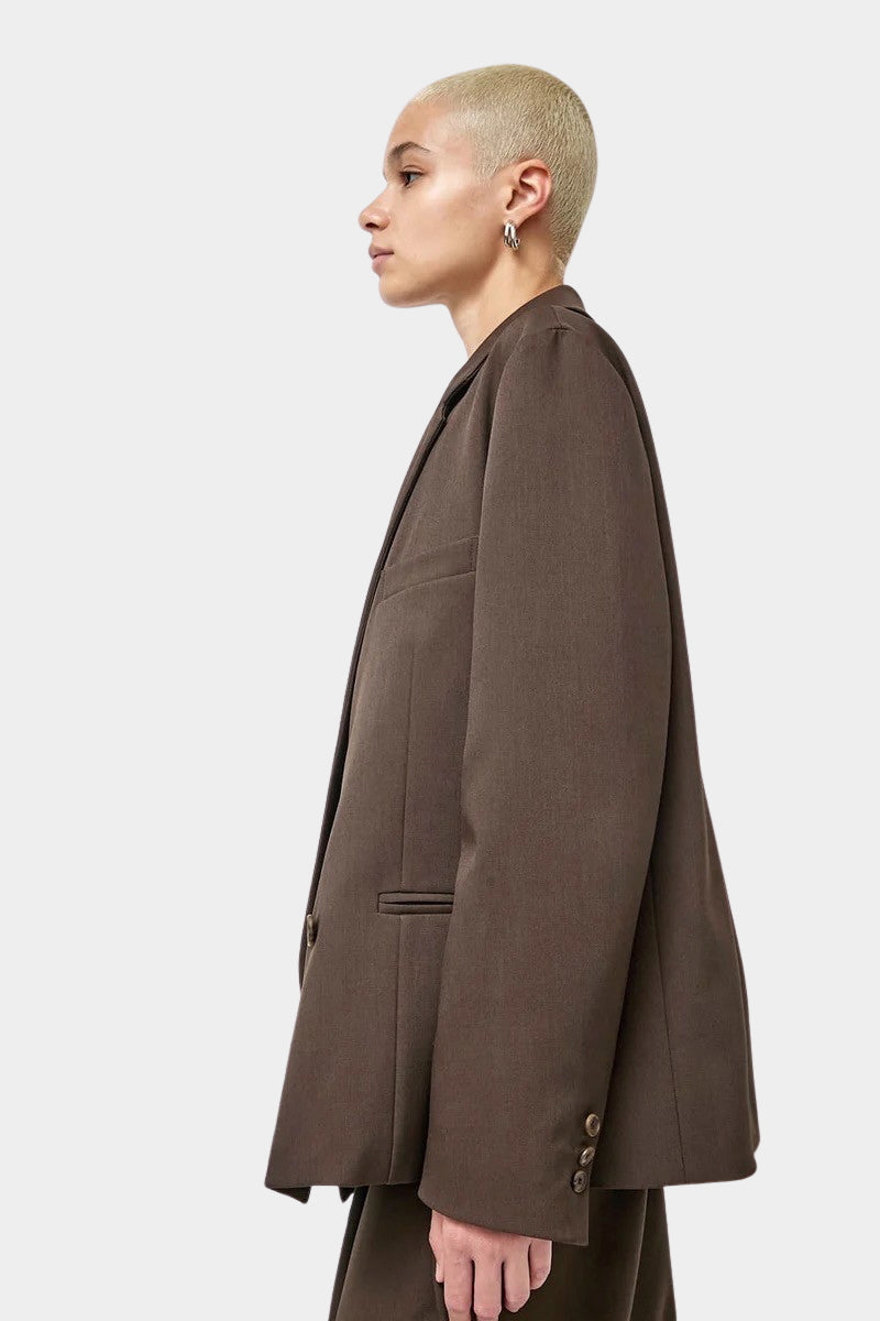 No.6 Austin Blazer in Chocolate, side profile showing the welt pocket and hem