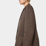 No.6 Austin Blazer in Chocolate, side profile showing the welt pocket and hem