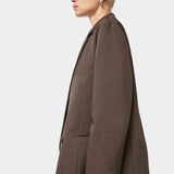 No.6 Austin Blazer in Chocolate, side profile showing the welt pocket and hem