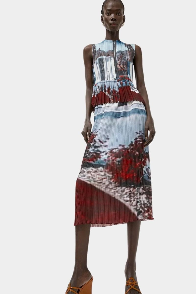 Full length view of No.6 Hiroko skirt in Cinema print paired with matching pleated top, featuring fluid movement and scenic abstract print
