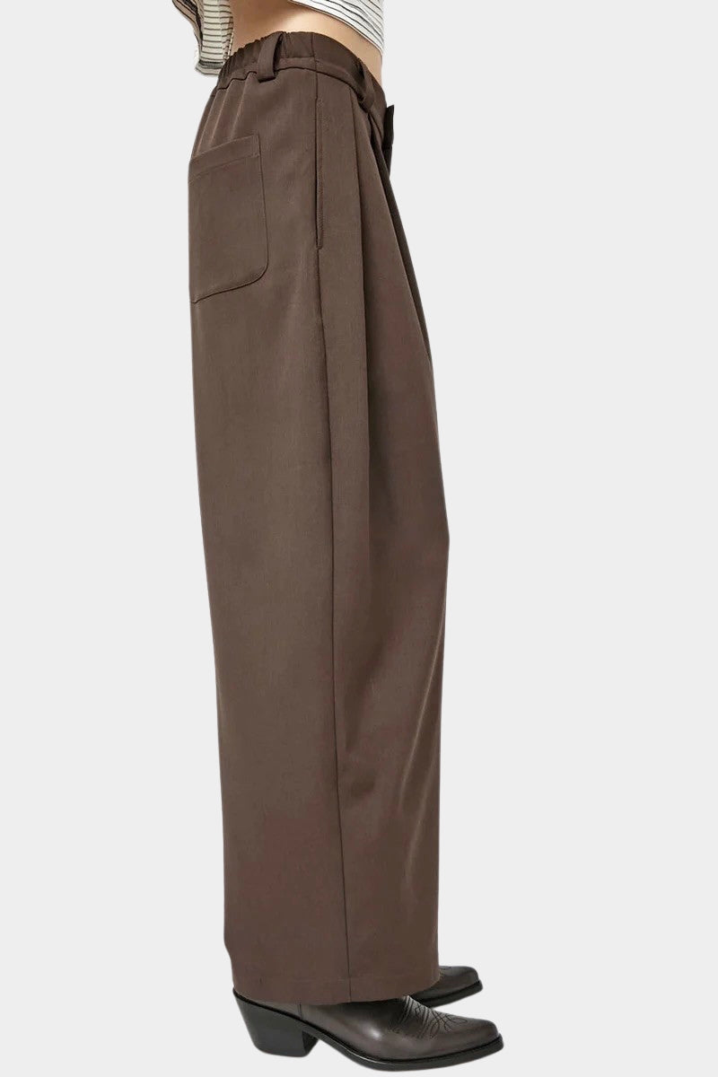 No.6 Holland Pant in Chocolate, side view showing the back patch pocket and leg shape