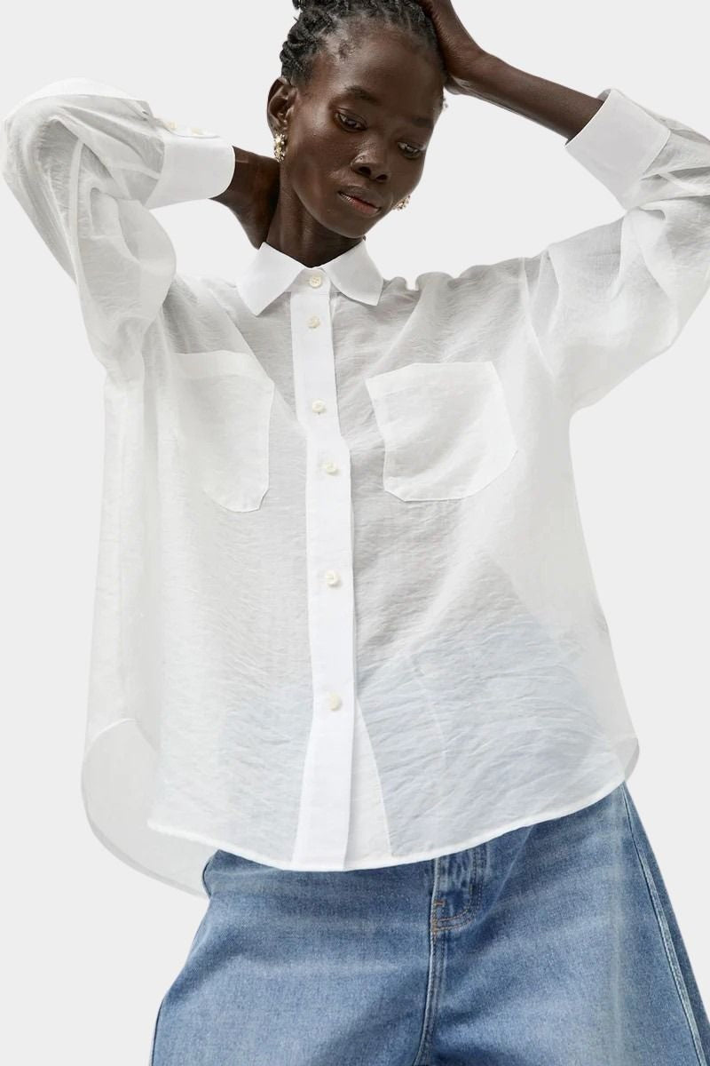 No.6 Lake Shirt in White Organza styled oversized with sheer organza texture, front patch pockets, button front closure, and airy lightweight structure.