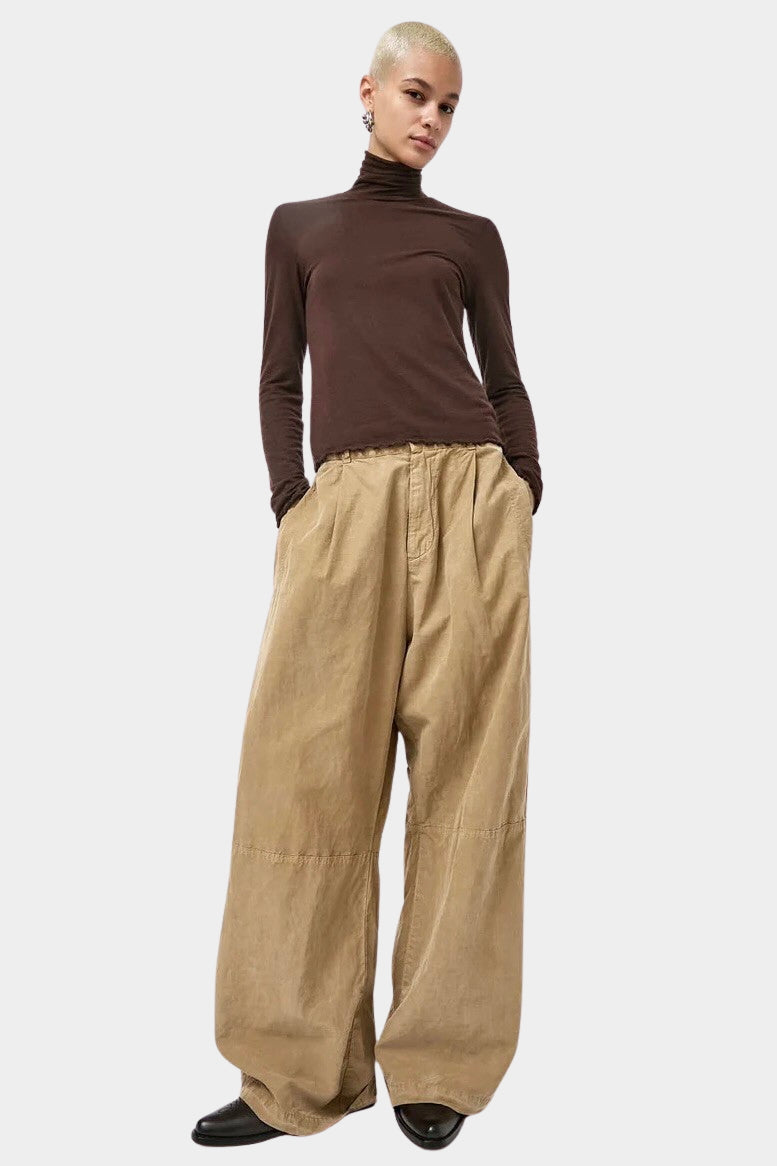 No.6 Lennon Turtleneck in Espresso, full length styling with wide leg tan pants