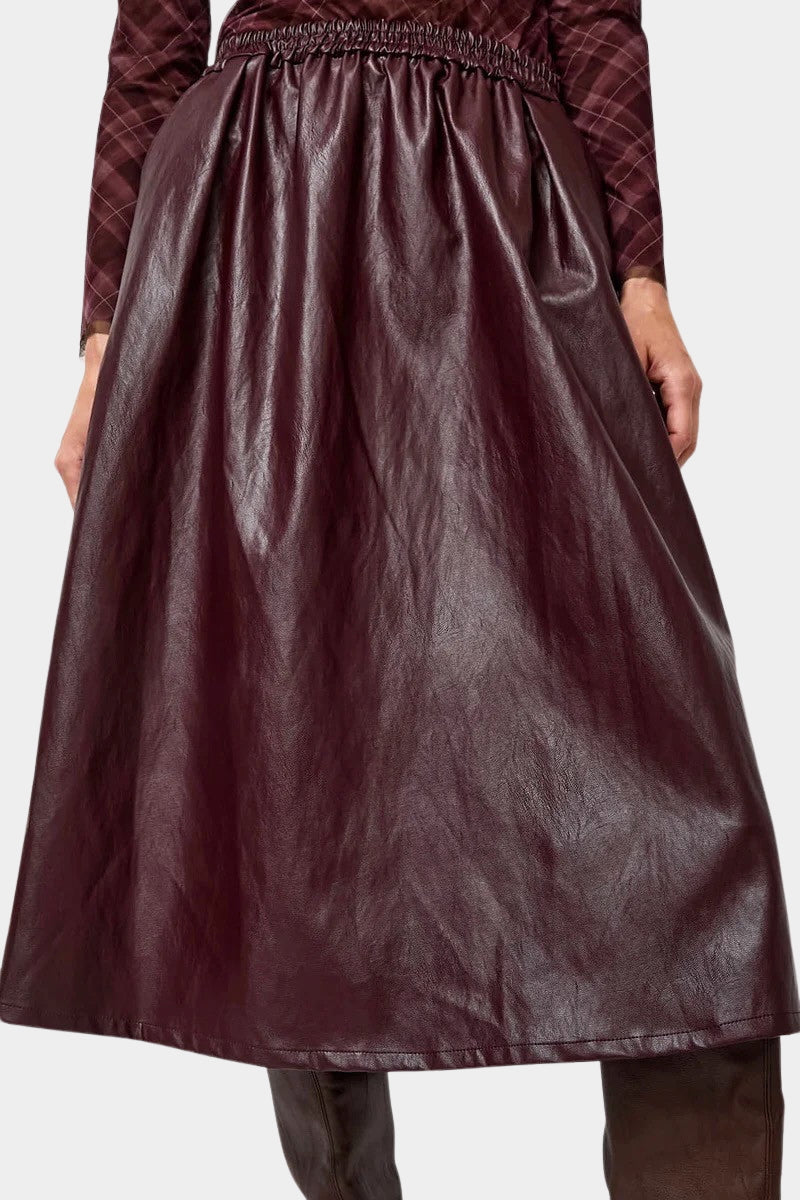 No.6 Mel Skirt in Bordeaux, front close view of the shirred waist and full A-line shape at YUCCA Denver
