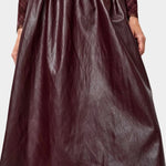 No.6 Mel Skirt in Bordeaux, front close view of the shirred waist and full A-line shape at YUCCA Denver