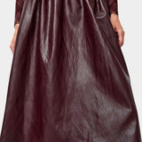 No.6 Mel Skirt in Bordeaux, front close view of the shirred waist and full A-line shape at YUCCA Denver