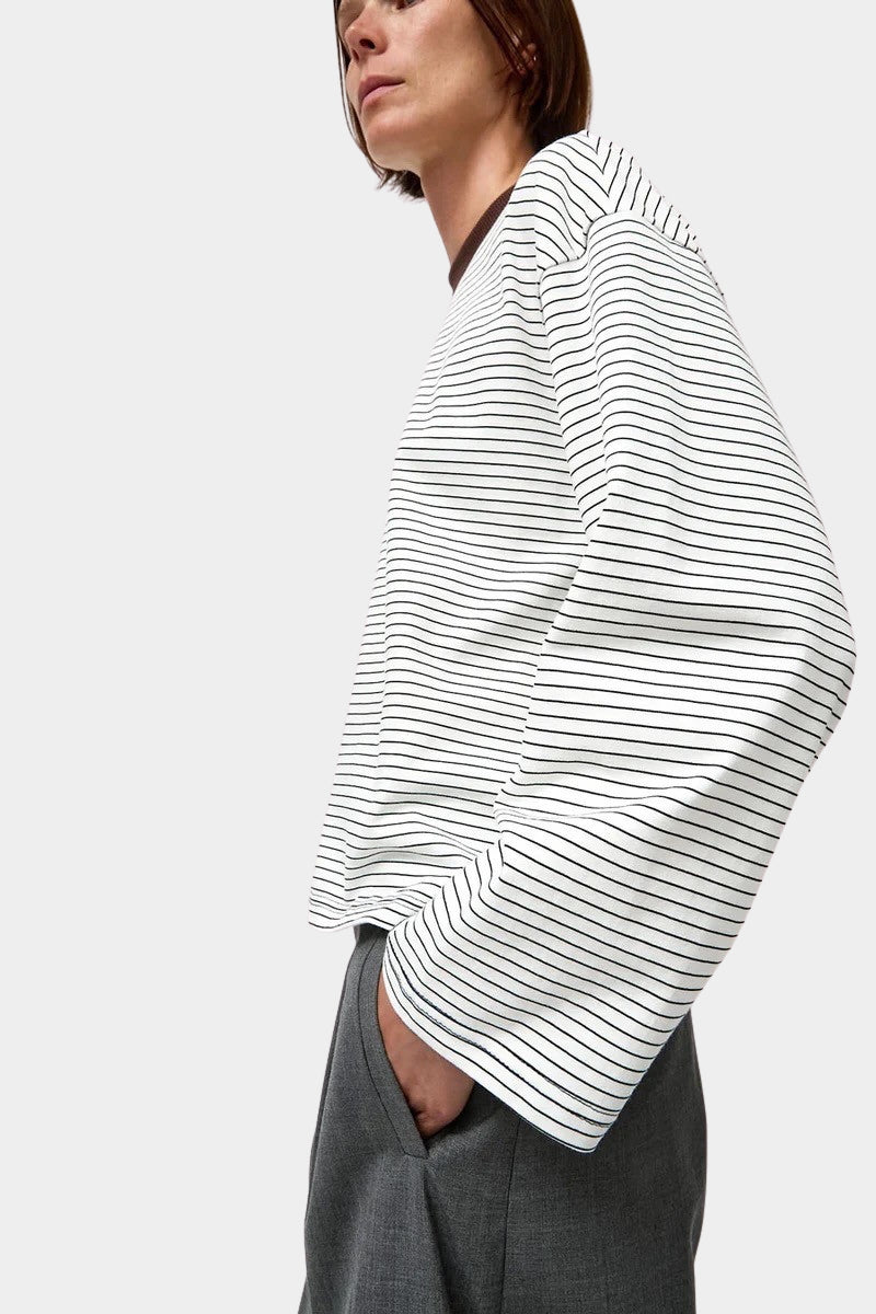 No.6 Nora Top in White Stripe, side profile highlighting the dropped shoulder and wide cuff