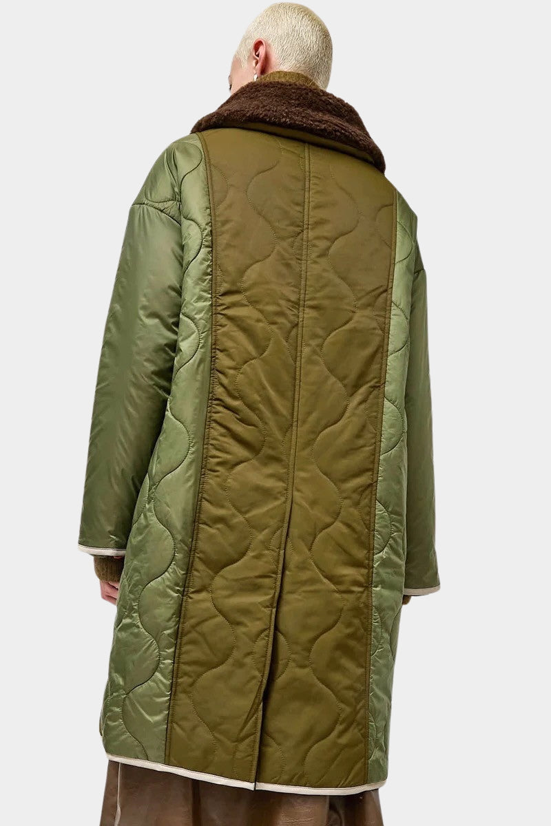 No.6 Summit Jacket in Olive, back view showing the contrasting quilted panels and long hem