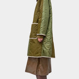 No.6 Summit Jacket in Olive, full side profile showing the relaxed shape and above knee length
